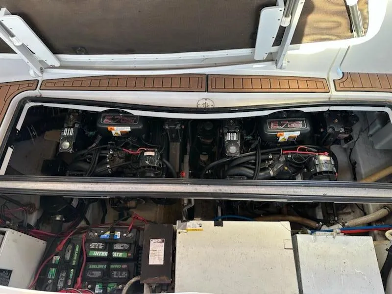 Slide: The Image of Engine compartment of 2000 Four Winns 328 Vista boat, featuring dual 5.7GSi engines. - 30