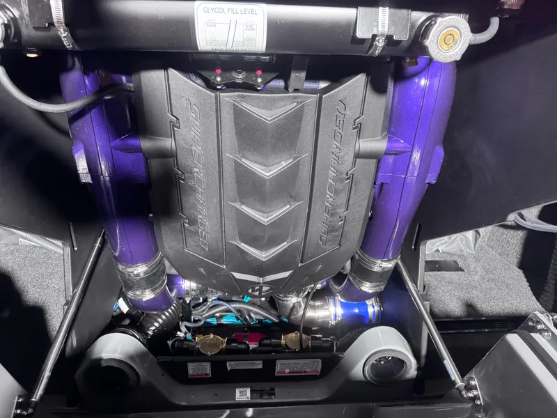 Slide: The Image of 2025 MasterCraft X24 engine with purple components and sleek design. - 11
