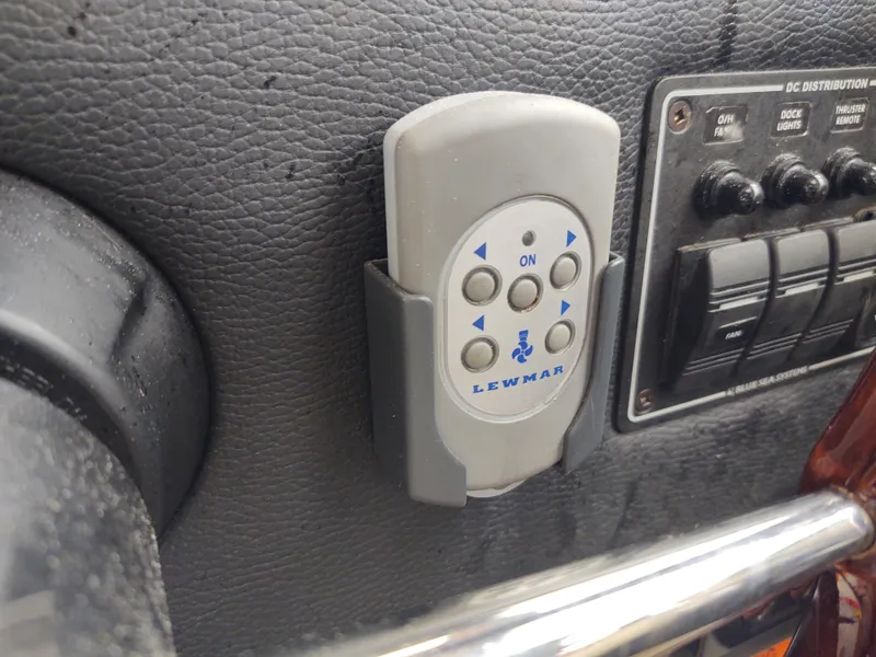 Slide: The Image of Lewmar remote control on 2018 Cutwater C-302 Coupe dashboard. - 33