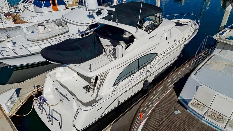 The Image of 2008 Meridian 580 Pilothouse yacht docked at marina, aerial view. - 0