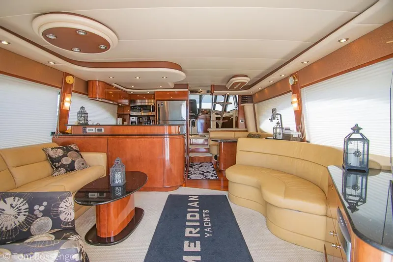 Slide: The Image of Luxurious interior of 2008 Meridian 580 Pilothouse yacht with elegant furnishings and modern kitchen. - 11