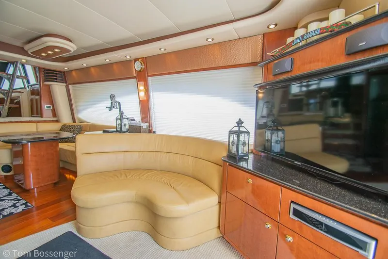 Slide: The Image of Luxurious interior of 2008 Meridian 580 Pilothouse yacht with elegant seating and entertainment area. - 13