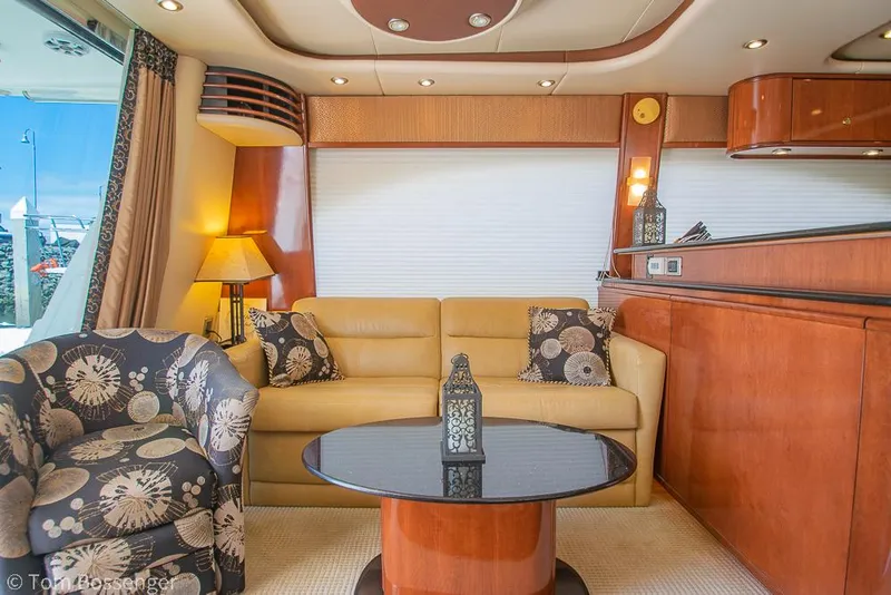 Slide: The Image of Luxurious interior of 2008 Meridian 580 Pilothouse yacht with elegant seating and decor. - 14