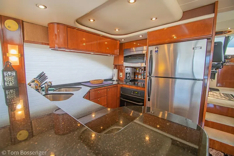 Slide: The Image of Luxurious kitchen interior of 2008 Meridian 580 Pilothouse yacht with modern appliances. - 19