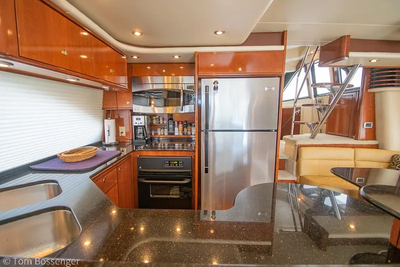 Slide: The Image of Luxurious kitchen interior of 2008 Meridian 580 Pilothouse yacht with modern appliances. - 20