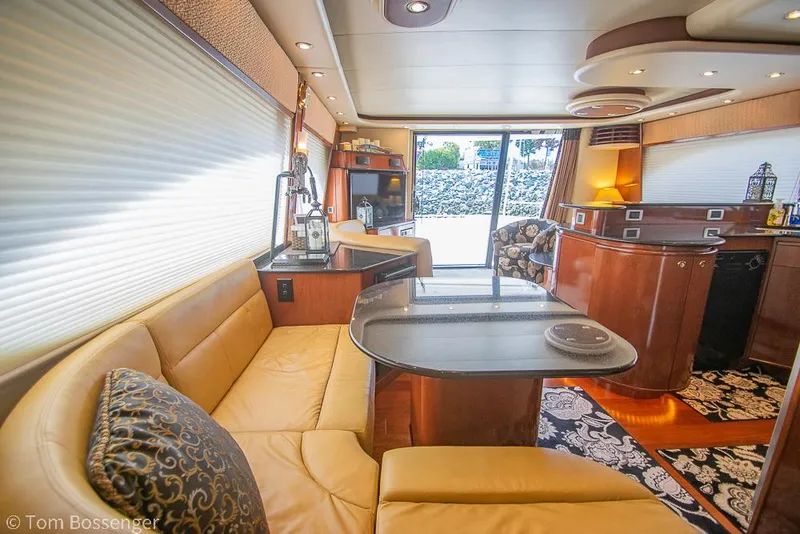 Slide: The Image of Luxurious interior of 2008 Meridian 580 Pilothouse yacht with elegant seating and modern amenities. - 26
