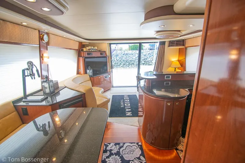 Slide: The Image of Luxurious interior of 2008 Meridian 580 Pilothouse yacht with elegant furnishings. - 27