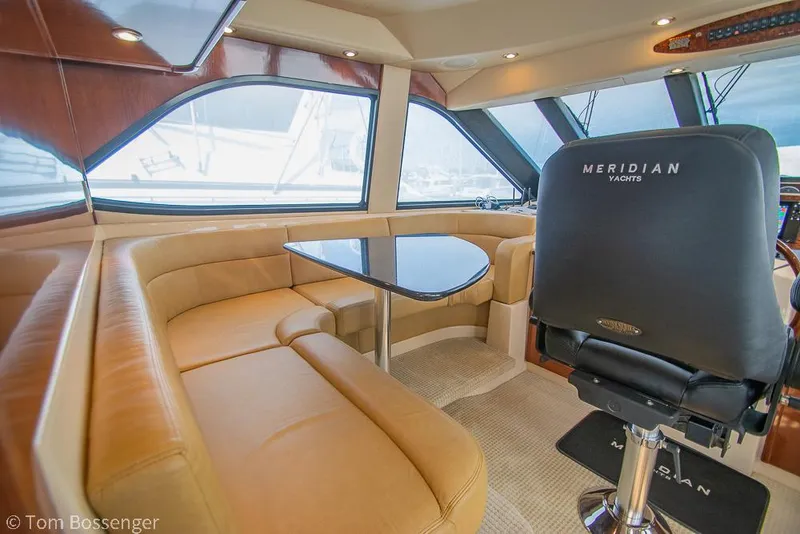Slide: The Image of Luxurious interior of 2008 Meridian 580 Pilothouse yacht with plush seating and elegant design. - 30