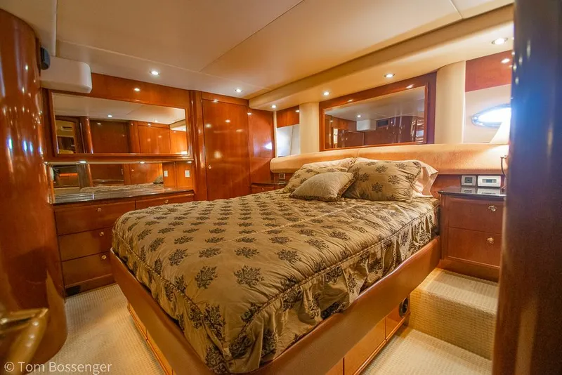 Slide: The Image of Luxurious bedroom in 2008 Meridian 580 Pilothouse yacht with elegant wood finishes. - 41