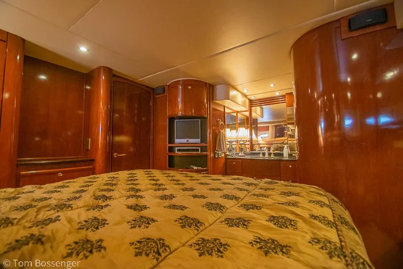 Slide: The Image of Luxurious interior of 2008 Meridian 580 Pilothouse with elegant wood finish and cozy bedding. - 43