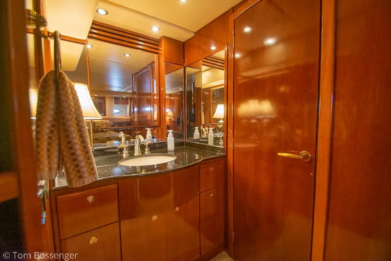 Slide: The Image of Luxurious bathroom interior of 2008 Meridian 580 Pilothouse yacht with wood cabinetry and elegant fixtures. - 45