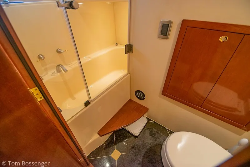 Slide: The Image of Bathroom interior of 2008 Meridian 580 Pilothouse yacht, featuring shower and toilet. - 46