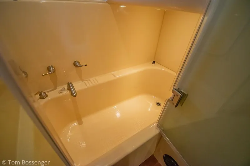 Slide: The Image of Luxurious bathtub in 2008 Meridian 580 Pilothouse yacht bathroom. - 47