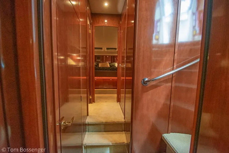 Slide: The Image of Interior hallway of 2008 Meridian 580 Pilothouse yacht with wooden paneling. - 48
