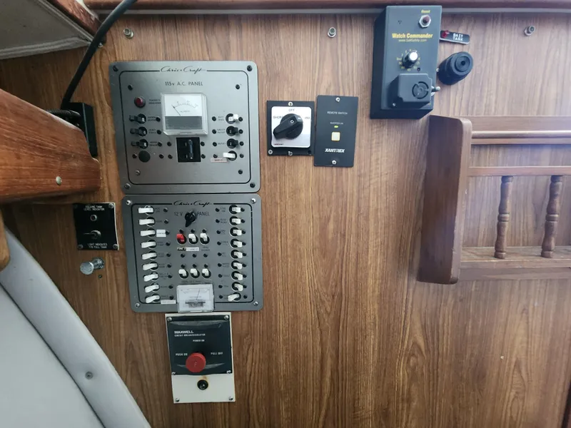Slide: The Image of Control panel of 1988 Chris-Craft 315 Commander boat with wood finish. - 38