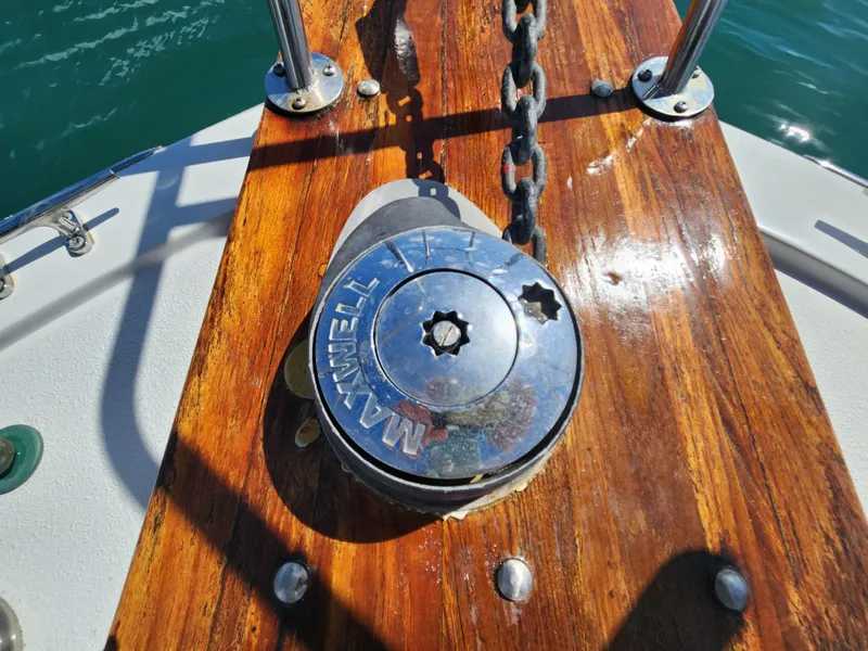 Slide: The Image of Anchor windlass on 1988 Chris-Craft 315 Commander boat deck. - 5