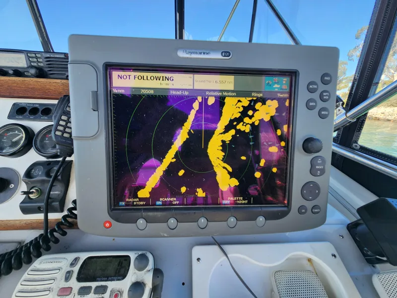 Slide: The Image of Radar display on 1988 Chris-Craft 315 Commander boat dashboard. - 8