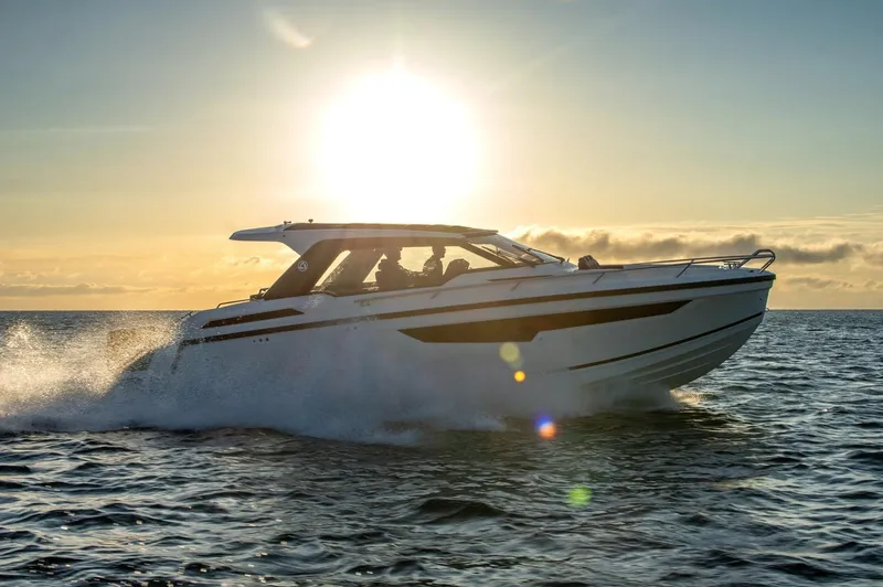 The Image of Parker Poland Sorrento 100 boat cruising at sunset, 2024 model. - 0