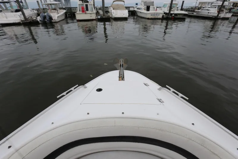 Slide: The Image of Bow view of 2002 Chaparral 280 SSi boat docked at marina. - 12