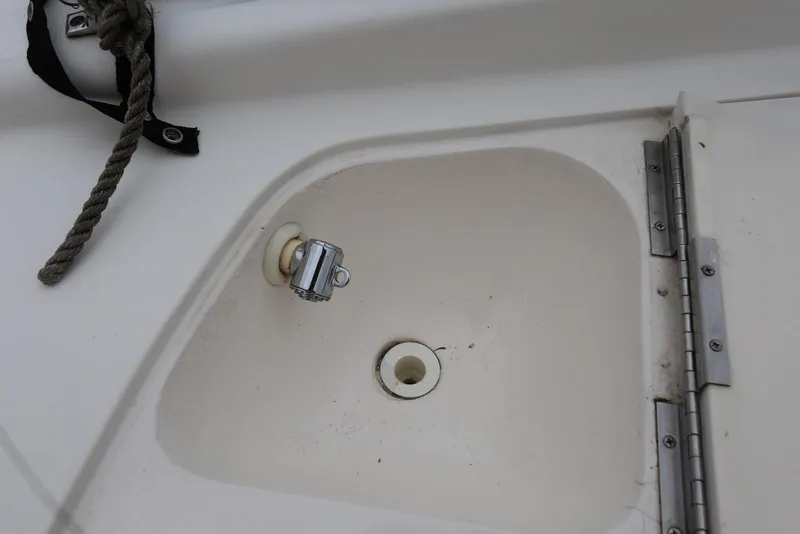 Slide: The Image of Compartment on 2002 Chaparral 280 SSi boat with rope and hinge detail. - 42