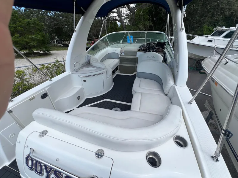 Slide: The Image of Interior of a 2005 Sea Ray Sundancer 260 with white seating. - 15