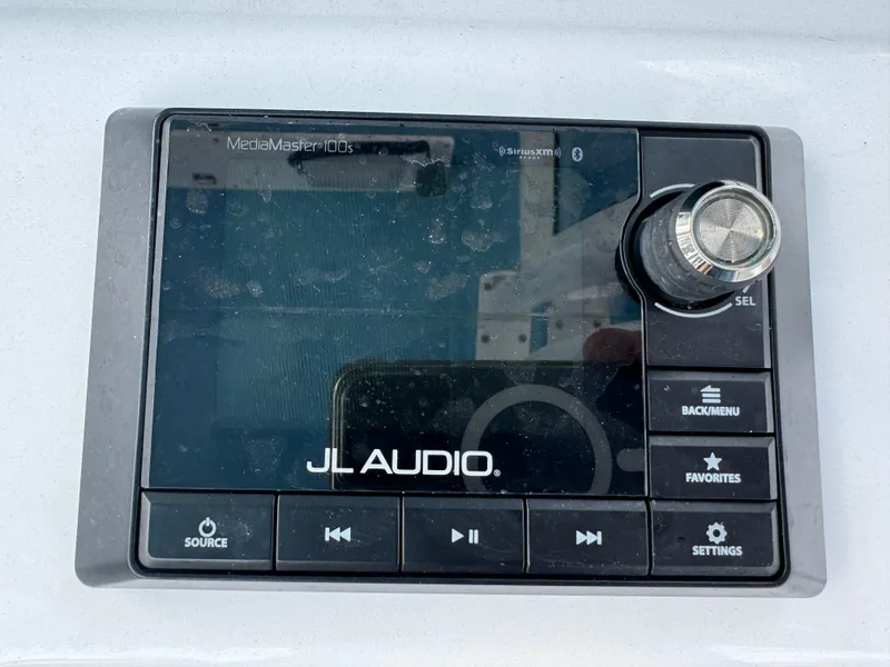 Slide: The Image of JL Audio MediaMaster MM105 on 2020 Sportsman Open 252 Center Console boat. - 29
