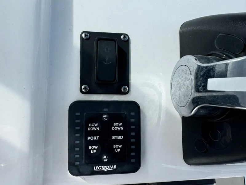 Slide: The Image of Control panel on a 2020 Sportsman Open 252 Center Console boat. - 30