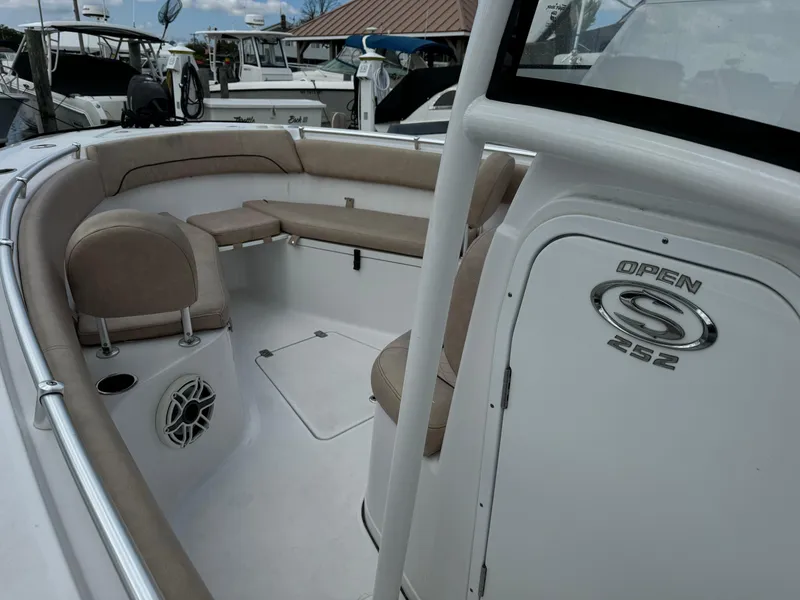 Slide: The Image of 2020 Sportsman Open 252 Center Console boat interior with cushioned seating. - 31