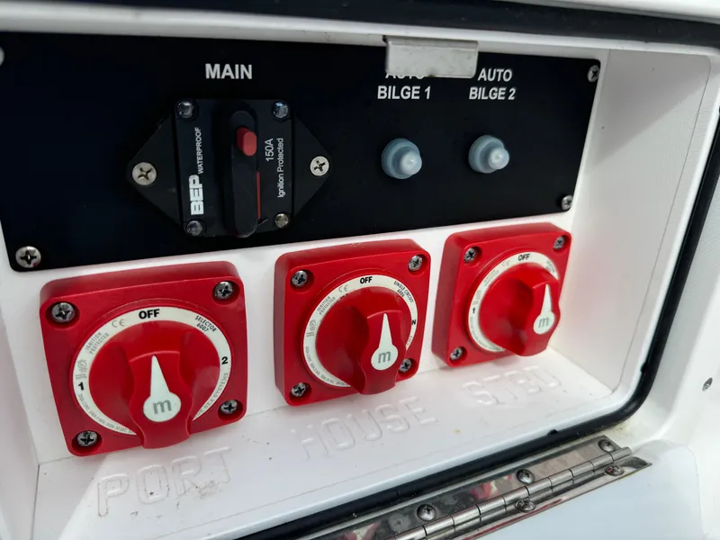 Slide: The Image of Control panel of a 2020 Sportsman Open 252 Center Console boat. - 35