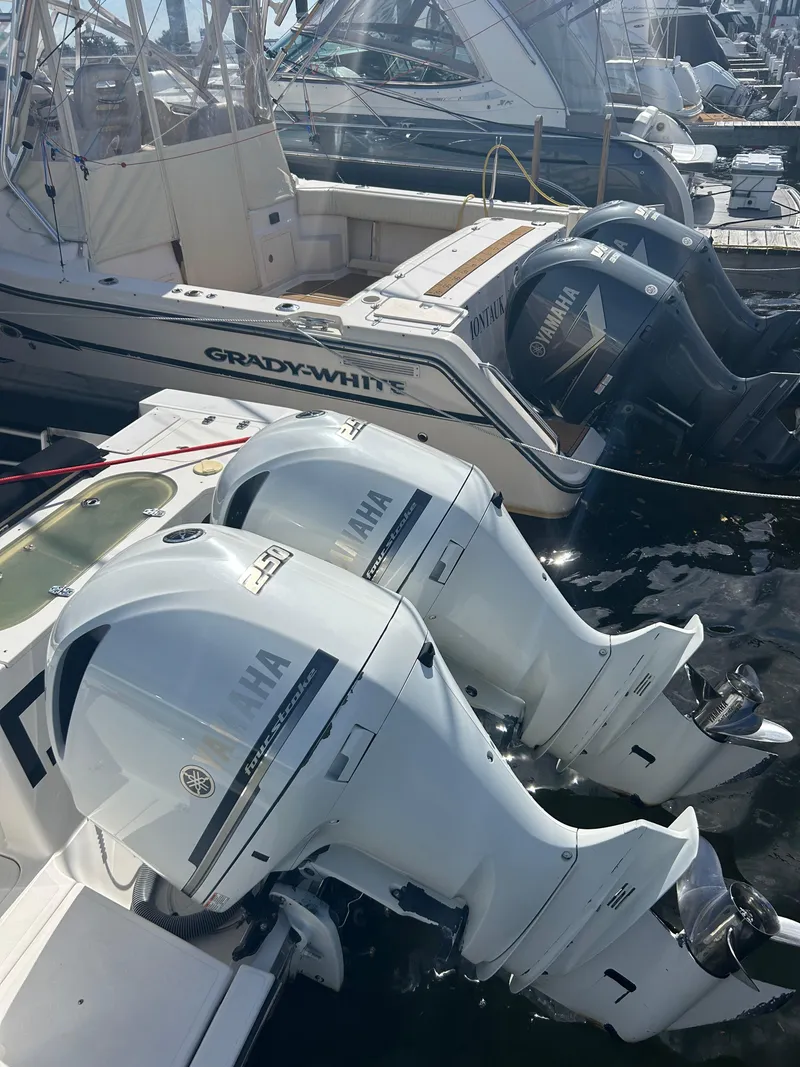 Slide: The Image of 2016 Pursuit S 280 Sport boat with Yamaha outboard engines docked at marina. - 16