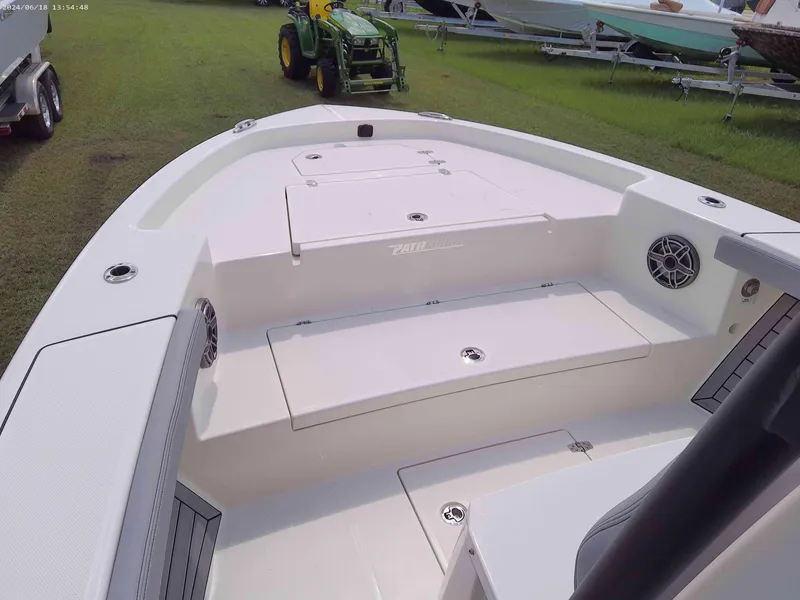 Slide: The Image of 2025 Pathfinder 2400 Open boat interior with seating and storage compartments. - 6
