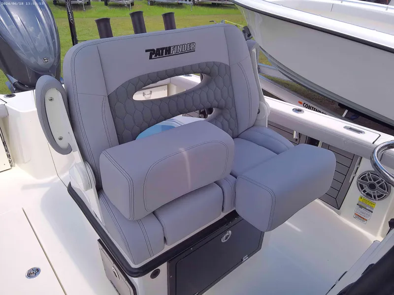 Slide: The Image of 2025 Pathfinder 2400 Open boat seat with gray upholstery and logo. - 9