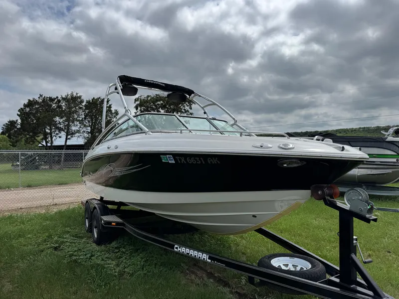 Slide: The Image of 2007 Chaparral 236 SSi boat on trailer under cloudy sky. - 6