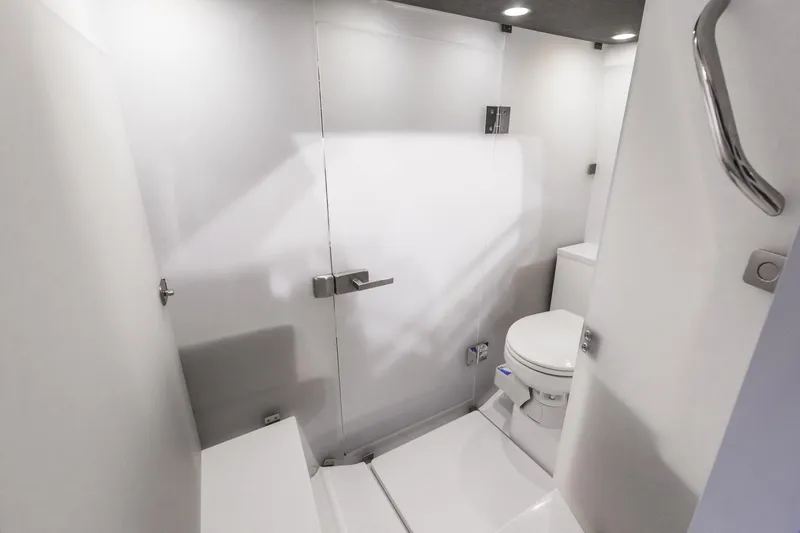 Slide: The Image of Modern bathroom in 2025 Axopar 37 XC CROSS CABIN boat, featuring sleek design and fixtures. - 35