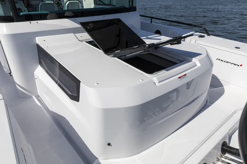 Slide: The Image of 2025 Axopar 37 XC CROSS CABIN boat detail, featuring sleek design and modern features. - 41