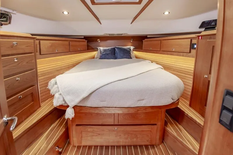 Slide: The Image of Luxurious cabin interior of 2026 Sabre 43 Salon Express yacht with wooden finish. - 19