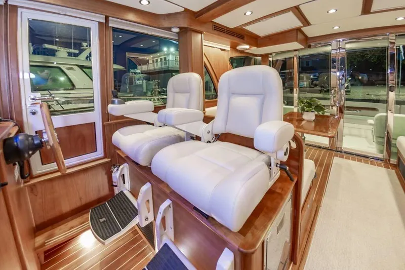 Slide: The Image of Interior of 2026 Sabre 43 Salon Express with luxurious seating. - 31