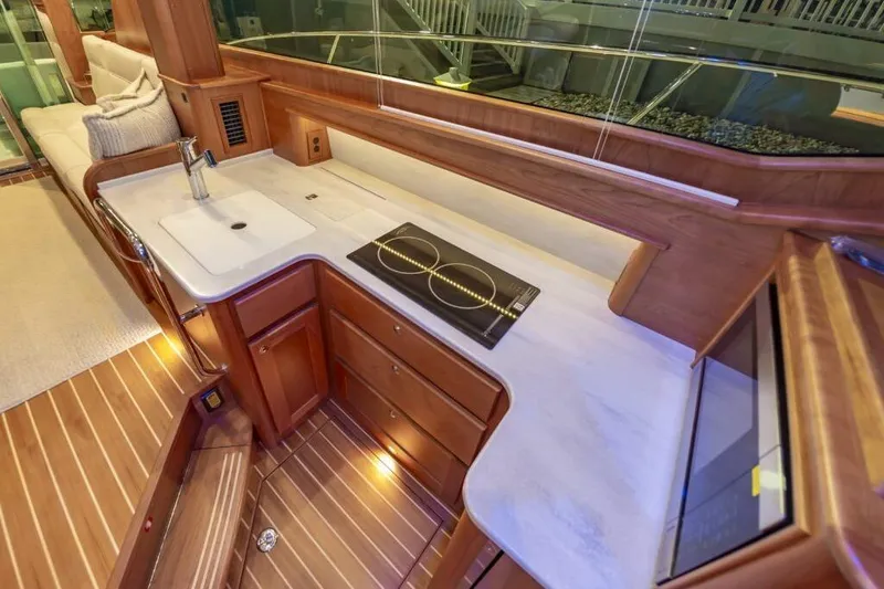 Slide: The Image of Interior of 2026 Sabre 43 Salon Express with modern kitchen. - 27