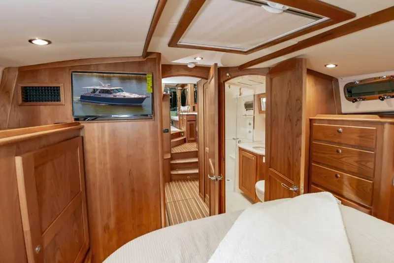 Slide: The Image of Luxurious interior of 2026 Sabre 43 Salon Express yacht with wood finish and modern amenities. - 17