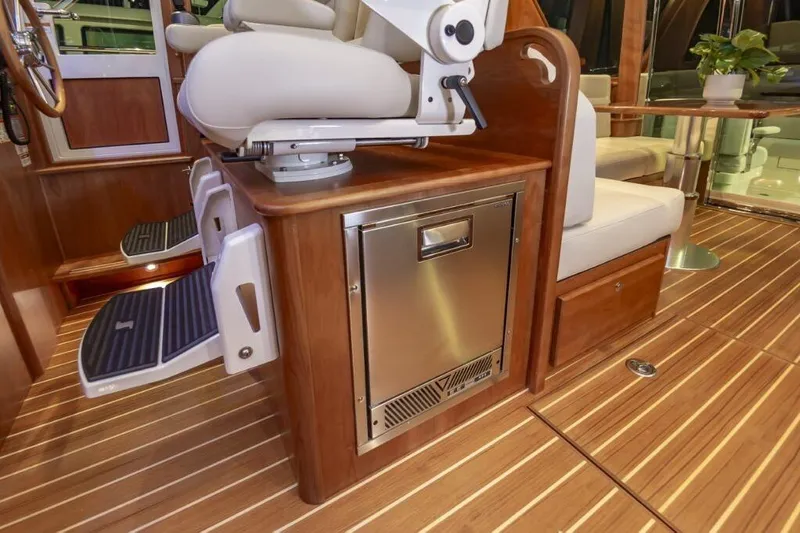 Slide: The Image of Interior of 2026 Sabre 43 Salon Express with wooden flooring and seating area. - 30