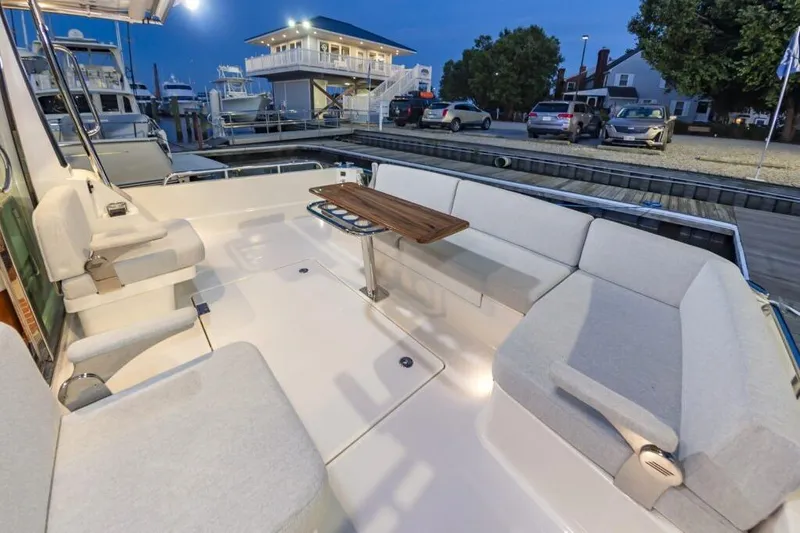 Slide: The Image of Interior of 2026 Sabre 43 Salon Express with elegant seating area. - 38