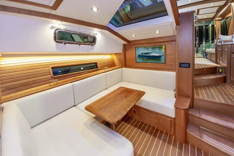 Slide: The Image of Luxurious interior of 2026 Sabre 43 Salon Express yacht with elegant wood finishes. - 23