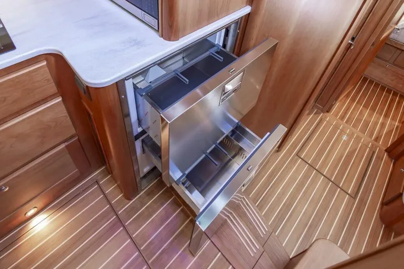 Slide: The Image of Interior of Sabre 43 Salon Express 2026 with open drawer. - 25