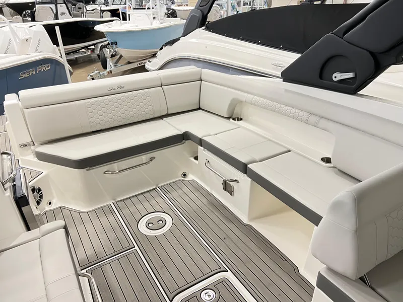 Slide: The Image of 2025 Sea Ray SDX 290 boat interior with luxurious seating and modern design. - 13