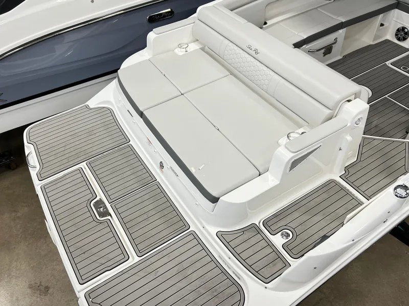 Slide: The Image of 2025 Sea Ray SDX 290 boat with spacious seating and sleek deck design. - 3