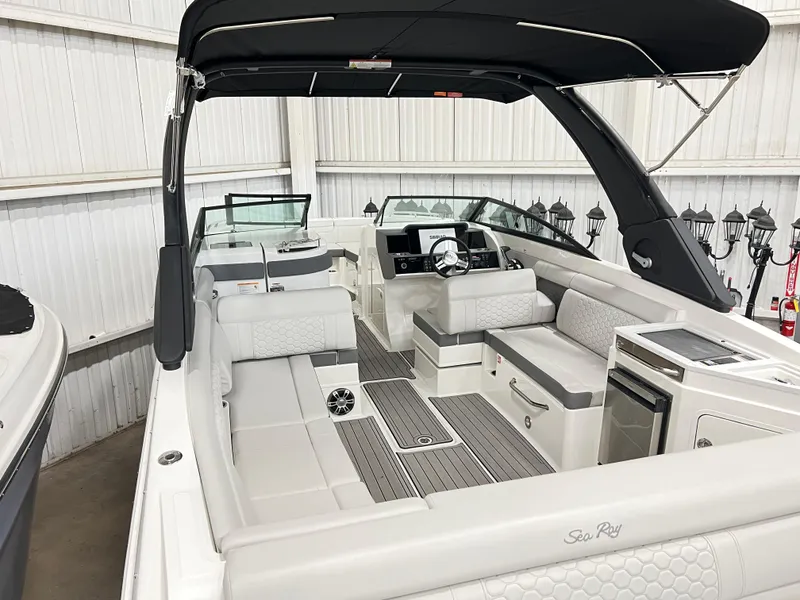 Slide: The Image of 2025 Sea Ray SDX 290 boat interior with luxurious seating and modern design. - 6