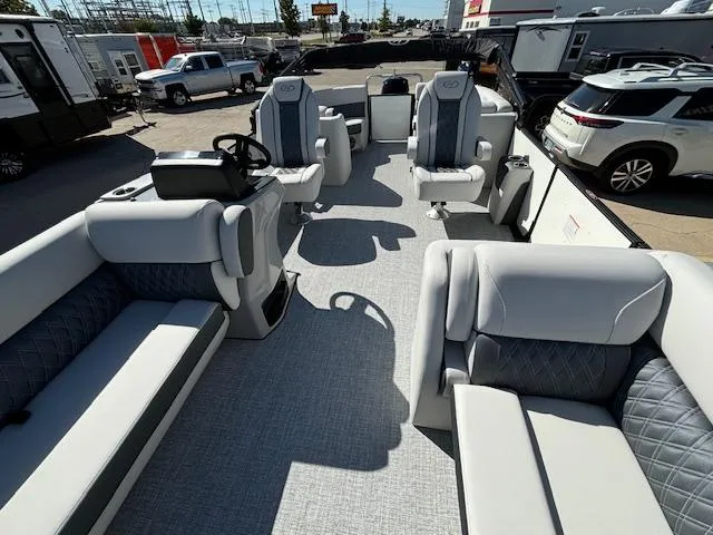 Slide: The Image of 2024 Harris Sunliner 230 CWDH pontoon boat interior with luxurious seating and modern design. - 18