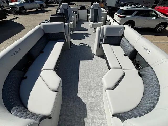 Slide: The Image of 2024 Harris Sunliner 230 CWDH pontoon boat interior with luxurious seating and modern design. - 19