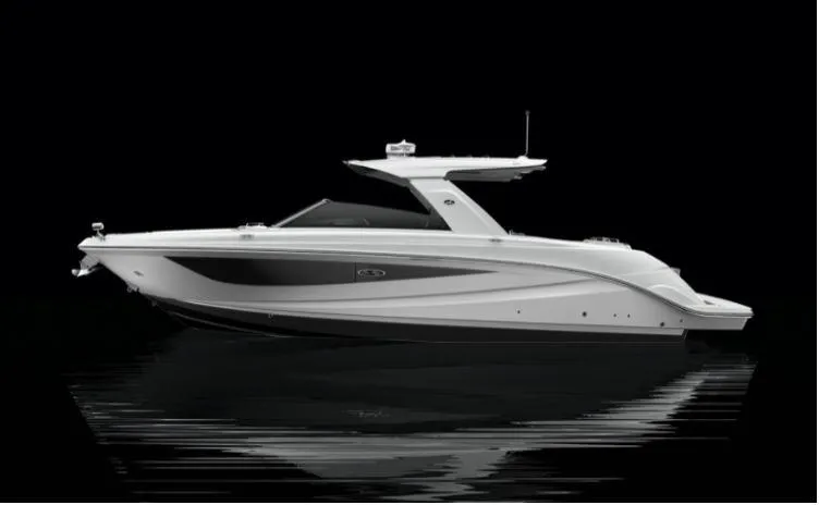 Slide: The Image of 2025 Sea Ray SLX 400 luxury boat on calm water, sleek design. - 18
