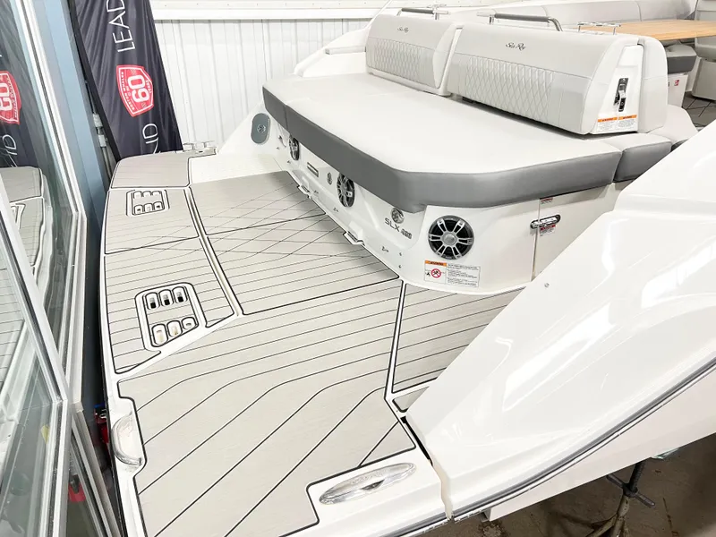 Slide: The Image of 2025 Sea Ray SLX 400 boat deck with seating and speakers. - 3